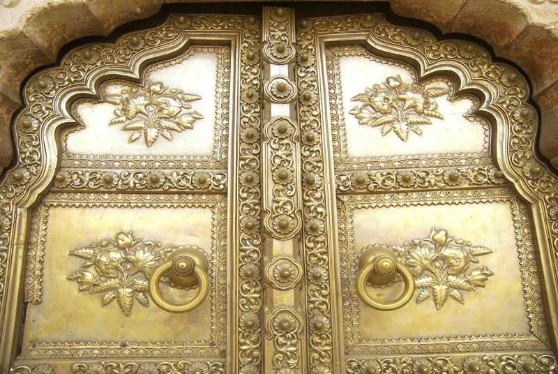 Golden metallic door in City Palace