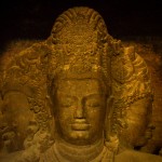 Rock salt carvings based on hindu and buddhist mythology in elephanta caves