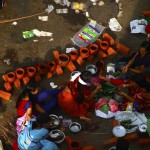 Women performing their rituals in Attukal Pongala