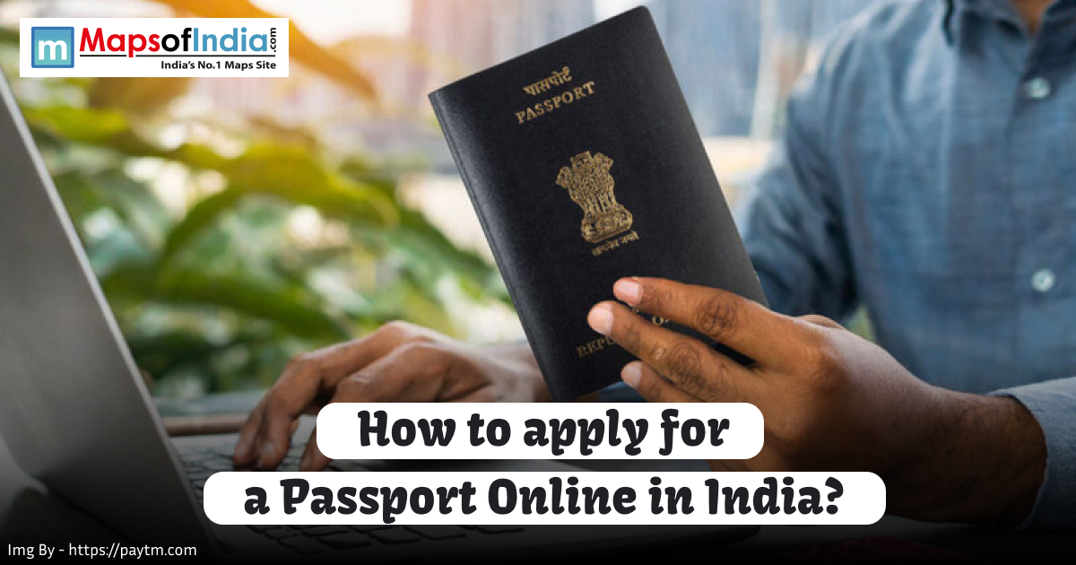 Person holding an Indian passport while using a laptop, representing the process of applying for a passport online in India.