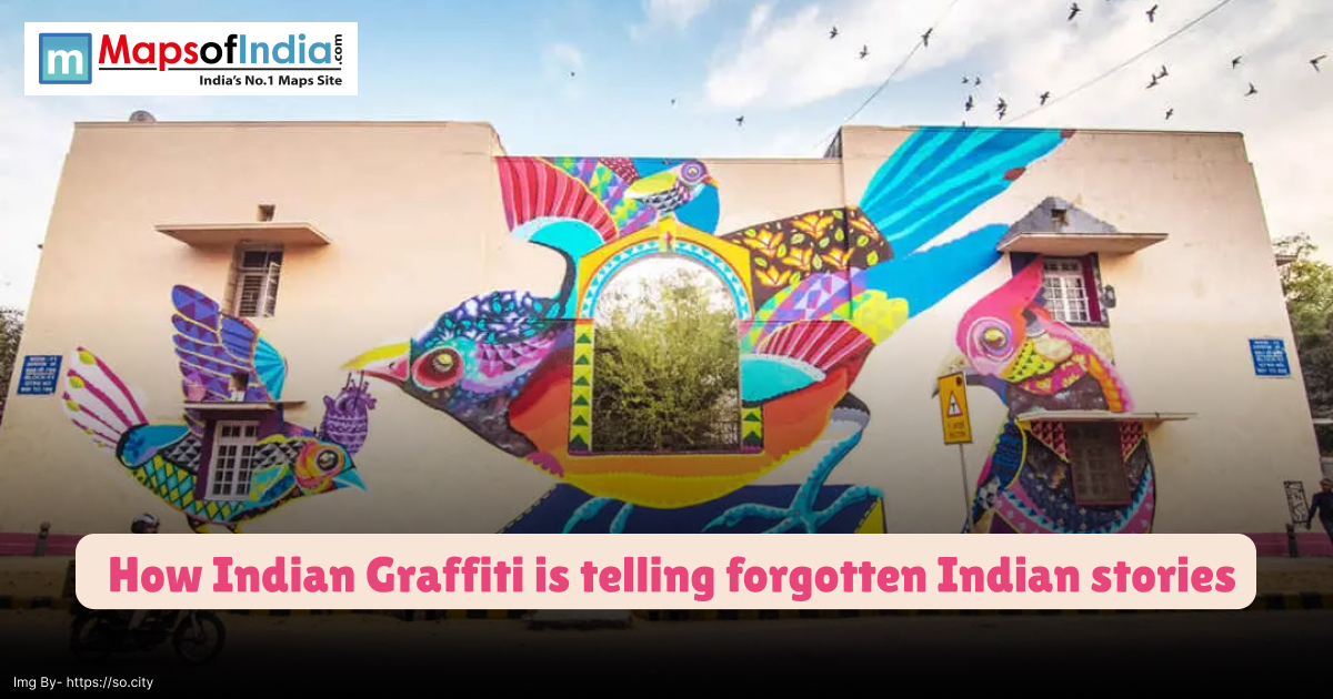 A vibrant graffiti mural of colorful birds painted across a building wall in India, symbolizing how Indian street art is reviving forgotten local stories.
