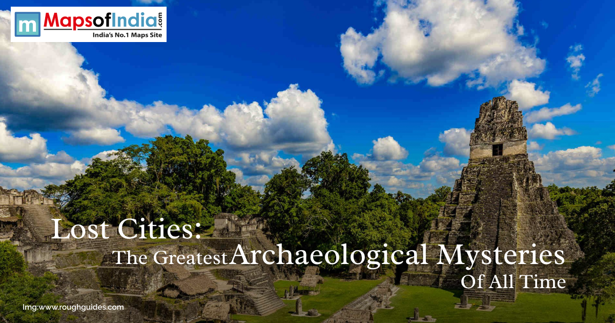 Ancient Mayan ruins surrounded by lush green forest under a bright blue sky with white clouds, representing lost cities and great archaeological mysteries.