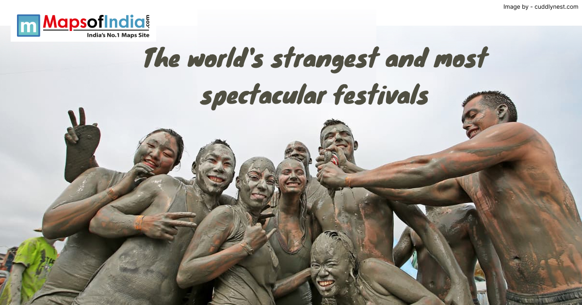 Group of people covered in mud enjoying a unique cultural celebration during one of the world’s strangest and most spectacular festivals