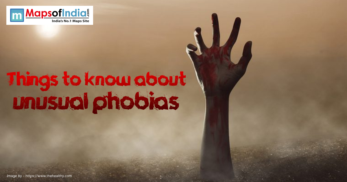 A dark and eerie image of a bloodied hand reaching out from the ground with fog.
