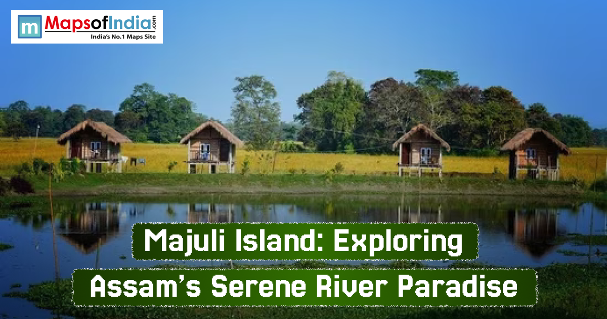 Scenic view of Majuli Island in Assam featuring traditional wooden huts on stilts beside a calm water body, surrounded by lush green fields and trees under a clear blue sky.