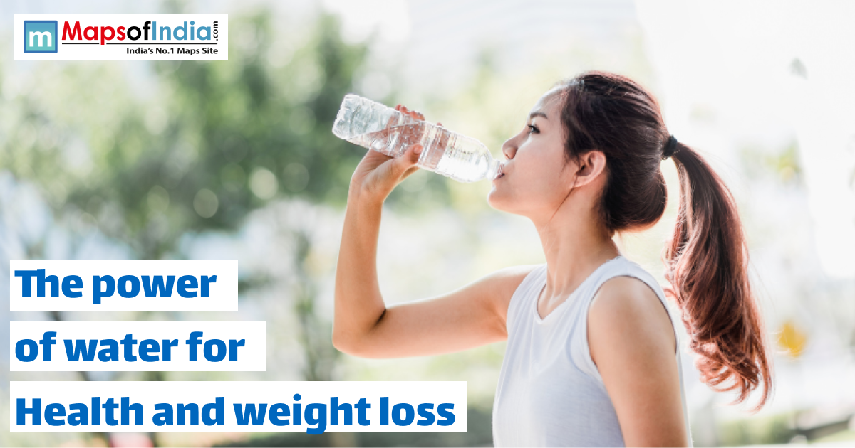 An Asian woman with her hair in a ponytail is outdoors, drinking water from a clear plastic bottle. The text on the image reads, "The power of water for Health and weight loss," with a "Maps of India" logo in the top left corner.