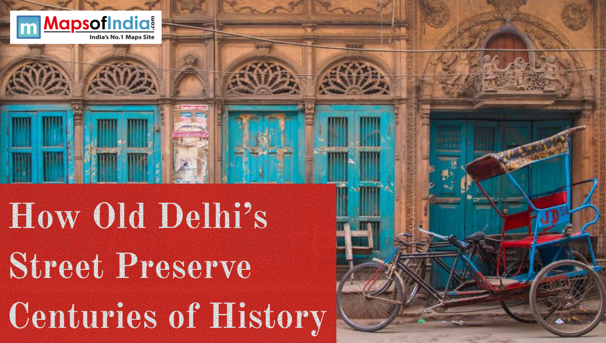 Historic Old Delhi street with carved arches, turquoise wooden doors, and a parked cycle rickshaw in front of a heritage building.