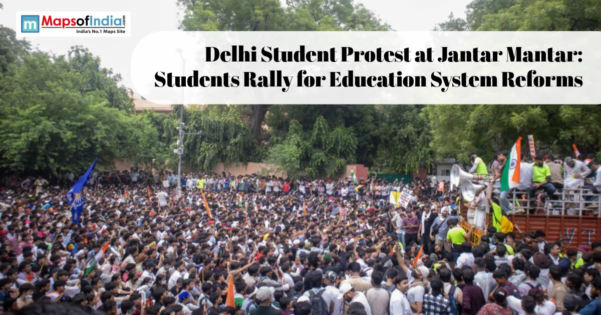 Large crowd of student protesters holding Indian flags and banners at a rally in Jantar Mantar, Delhi, with a headline overlay reading 'Delhi Student Protest at Jantar Mantar: Students Rally for Education System Reforms.'