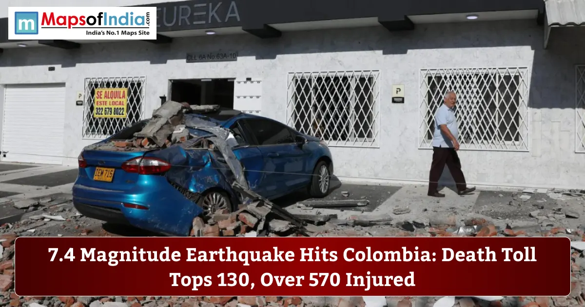 7.4 magnitude Colombia earthquake damage with a crushed car and fallen debris.